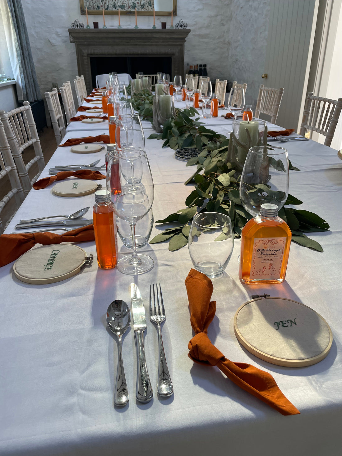 A table set in daylight for a wedding weekend at a Highland lodge in Scotland